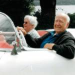 Gene Sherman, with his wife Peggy, drives his restored Corvette in 2001. (Sherman Family Photo)