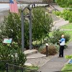 Islander Frank Zellerhoff Sr. rings the bell at Dockton Park on Maury Island shortly after 9 a.m. on Wednesday, Sept. 11, to honor the victims of the 2001 terrorist attacks. (Kevin Opsahl/staff photo)