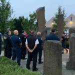 Sixteen year old Ella Yarkin plays the bagpipes at dawn at dawn on Sept. 11 at the Vashon fire station to pay tribute to the victims of the 2001 terrorist attacks. (Kevin Opsahl/staff photo)