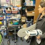 Kim Eckhardt, a physical therapist, picks up equipment for patients from the care closet at Vashons Lutheran church on Monday, Oct. 21 (Kevin Opsahl/Staff Photo).