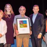 Vashon Heritage Museum officials Rota Brogan, Elsa Croonquist and Brian Brenno stand with King County Executive Dow Constantine and Jennifer Meisner, a historic preservation officer, during a ceremony to accept the Spellman Award for two of the museums exhibits (Courtesy Photo).