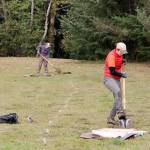 Archeologist Amanda Taylor digs a probe at the Burton Adventure Recreation Center (Paul Rowley/Staff Photo).