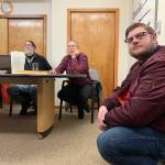 Dominic Jovanovich, an island resident and shop steward for Water District 19, listens to a community member speak during a board of commissioners meeting on Tuesday, Jan. 14. Jovanovich and his allies were successful in getting the board to vote in favor of a union contract despite it not being listed on the meeting agenda that night (Kevin Opsahl/Staff Photo).