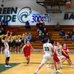 VHS Junior center Levi Moore (No. 40) tries to block a dunk from one of the Warriors. JJ Bogaard (below) shoots a hoop on the free throw line as Finbarr Anderson (No. 33) and Isaac Patchen (No. 30) look on. (Pam Stenerson Photos)