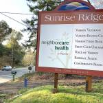 The sign for Neighborcare Health, the entrance to Sunrise Ridge, is seen along Vashon Highway in February. (Kevin Opsahl/Staff Photo)
