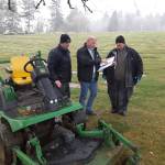 Auburn Mountain View Cemetery Manager Craig Hudson, center, confers with two maintenance workers. ROBERT WHALE, Auburn Reporter