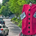 A performer dons an eye-catching costume to welcome visitors