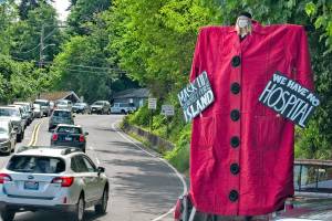A performer dons an eye-catching costume to welcome visitors