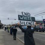 Last Saturday, islanders lined up to protest the death of George Floyd and other African-American men and women who have died while in police custody (Tom Hughes Photo).