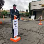 Last Saturday, Grannys Attic business manager Tim Johnson pointed the way toward a re-opened donation service for the popular thrift store (Tom Hughes Photo).