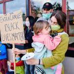The candlelit vigil to honor George Floyd drew both young and old to Vashons downtown (Kent Phelan Photo).