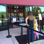 Islanders line up to receive a free lunch at Vashon Island High School. The islands food bank has provided more than 2,700 meals for children and adults in the first three weeks of Picnics to Go, in collaboration with the school district (Courtesy Photo).