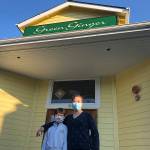 Angela Wu, owner of Green Ginger Chinese Restuarant, and her nine-year-old niece, Sandy Wu, outside the eatery last week (Thomas Hughes Photo).