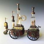Possibilities, by Morgan Brig, is wheeled copper artwork made with three vintage glass bottles from the collection of VIPP founder Barbara Drinkwater (Courtesy Photo).