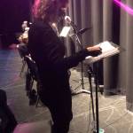 Kate Dowling, an ensemble member of Vashon Repertory Theater, gets ready to record the radio drama, The War of the Worlds (Mik Kuhlman Photo).