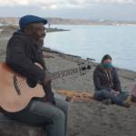 Clinton Fearon sings on KVI Beach in the video for his new single, Fix It (Courtesy Photo).