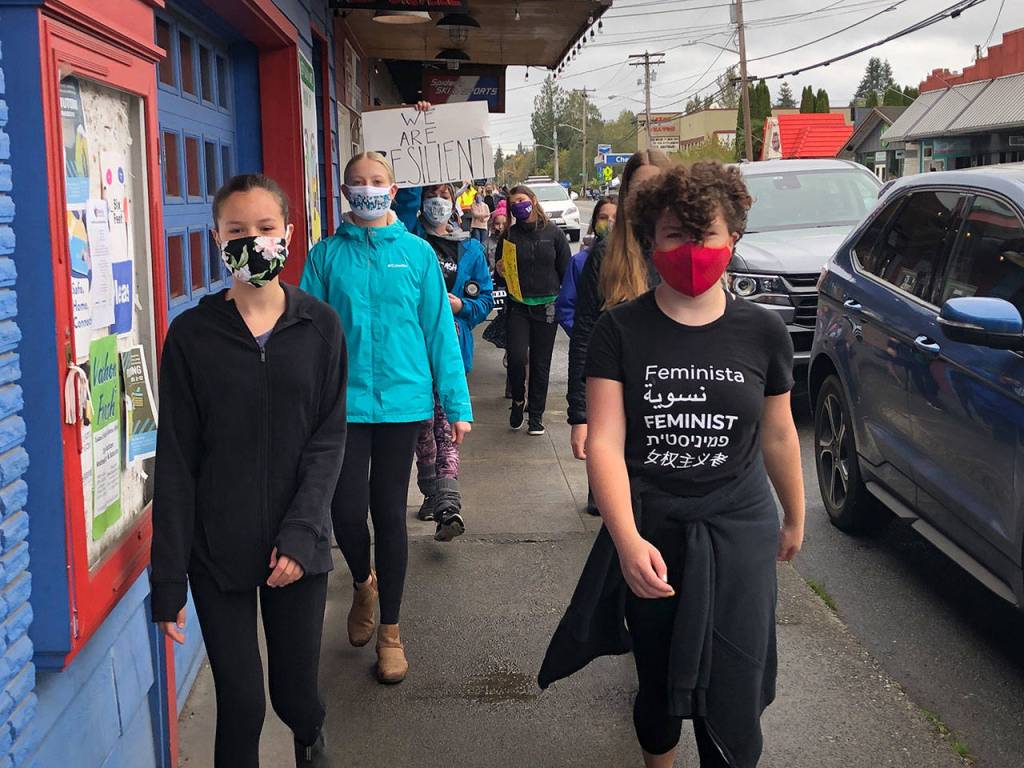 Unofficial Mayors Raena Joyce and Selene Dalinis lead a Womens March in October (Elizabeth Shepherd Photo).