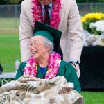 Mary Matsuda Gruenewald, with her son Ray Gruenewald, at Vashon High Schools graduation ceremony in 2017. That year, the school awarded Mary the high school diploma she would have received 75 years earlier, had she not been part of the mass evacuation and internment of people of Japanese ancestry on the West Coast (Kent Phelen Photo).