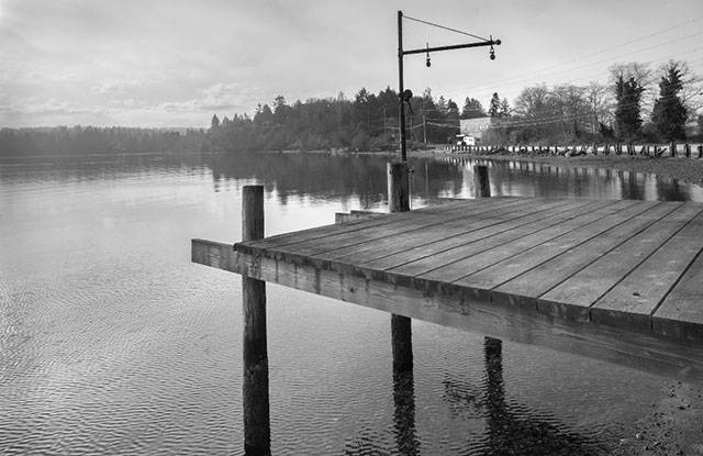A Quiet Morning, Portage and was taken on Feb. 27, by island photographer Terry Donnelly, with the intention of communicating a sense of the quiet mood of Portage on a calm morning. Although I did not intend to illustrate the poem literally, I believe it captures the peace of the Portage neighborhood, its relationship to the sea and how, from this isolated dock, one might sit and watch the sea contemplating what lies below as Ferlinghetti did from his window, Donnelly said (Terry Donnelly Photo).