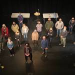VCAs staff and a few board members, with executive director Allison Halstead Reid front and center, spread out to fill the stage of the arts centers Katherine L White Hall, in anticipation of re-opening the space to live audiences in late March (Tom Hughes Photo).