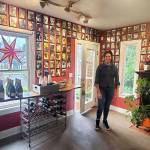 Hedy Anderson, owner and chef at Vashons Sugar Shack, has created a wall of portraits of islanders dogs (and a few cats) inside her business (Phil Clapham Photo).