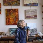 Local painter Carol Schwennesen, in her studio (Annie Marie Musselman Photo).