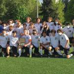The VHS boys varsity soccer team gathers to celebrate after winning the league championship (Lila Cohen Photo).