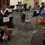 French Horn player Torin Kavanagh; Alto Saxist Stella Nackos; Flutist Briar Guenther and trombonist August Kampmeir have all adapted to varying forms of PPE and precautions for playing their instruments in band class (Lance Morgan Photo).
