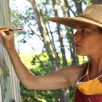 Island artist Britt Freda worked with 5th-grade teachers Jen Lindsay, Layla Tanner, Nancy Jones, and Madalyn Brown and their students at Chautauqua Elementary to create a collaborative public art installation of painted cedar salmon (Dana Schuerholz Photo).