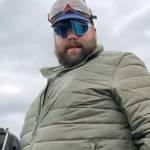 Daniel Scott (center, in green jacket) and Eddie Block (bottom right) are shown in a video before the Proud Boys and other rioters stormed the U.S. Capitol building on Jan. 6 in Washington, D.C.