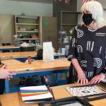 Alex McDonald and Lynann Politte discuss how to frame McDonalds original works (Courtesy Photo).