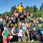 The Pirates Wrestling Team persevered through the pandemic and finished with Vashon style and flair, getting numerous pins and wins, and wowing the crowd with their focus and intensity (Zabette Macomber Photo).