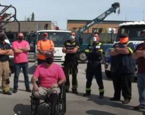 Shortly after tow truck technician, David Rios, lost his leg in a collision, his employer — Chappelle’s Towing, LLC. — and Clark County Fire District 6 joined AAA Washington to create a PSA with the support of and participation from WSDOT highway crew, WSP troopers and operators from Speed’s Towing, TLC Towing & Recovery, and Triple J Towing. Photo courtesy of AAA.