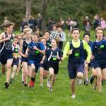 (John Decker Photo) Bodie Thomas leads the Mustang boys out from the start line.