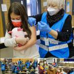 (Rick Wallace Photos, with child and parent permissions) Dozens of children and their parents showed up for last weeks School District vaccination clinics. The crowd filled the school cafeteria (bottom left) as more than 40 volunteers checked them in, ushered them to a vaccination station, and monitored them for 15 minutes after their shots.
I dont like shots at all, but COVID has been here for two years so this is 100% worth it, said fourth-grader Juniper Alanis (top) after getting her shot from MRC volunteer Lorraine Chambers. Tightly holding her friend, Floppy Axelrose, while getting the shot helped Juniper too. 
Melissa Ripka brought her twins and her eldest so they had a three-shot family moment (bottom right). The volunteers are amazing, so many people, just astounding. This comes at a wonderful time because my daughter will now be able to have her birthday party with friends next month. MRC volunteer Nodie Sullivan did the Ripka familys injection honors.