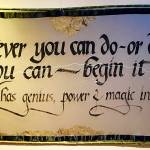 (Courtesy Photo) This large calligraphic work on silk by Kaj Berry hangs prominently at Open Space for Arts & Community.