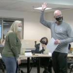 (Staff Screenshot) Allison Krutsinger and Slade McSheehy, immediately after Krutsingers swearing-in as a new school board member.