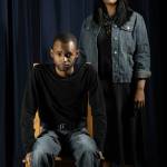 (Michelle Bates Photo) Rowin Breaux (seated) plays exoneree David Keaton who spent three years on death row for a crime he didnt commit. Keaton became the first person in the United States to be exonerated from death row, but remained in prison another six years. Alma Davenport (standing) portrays Georgia Hayes, who after spending six years on death row was exonerated and released based on recovered evidence of original records of the crime.