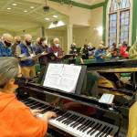 (Rick Wallace Photo) The Vashon Island Chorale will perform again, at last, at 7:30 p.m. Saturday, April 9, and 3 p.m. Sunday, April 10, at Vashon Center for the Arts. The group is seen here at rehearsal, at Vashon United Methodist Church.