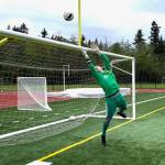 (John Thomas Photo) Senior captain Evan Keppler denies another shot during warm-ups against Seattle Christian.