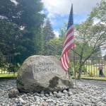 (Tom Hughes Photo) Vashons Cemeterys entrance is now marked with a tribute to two local veterans who lived and raised their families side by side on Vashon.