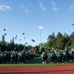 (Jenna Dennison Photo) The Vashon Island High School Class of 2022 tosses their caps into the air following the conclusion of Saturdays Commencement.