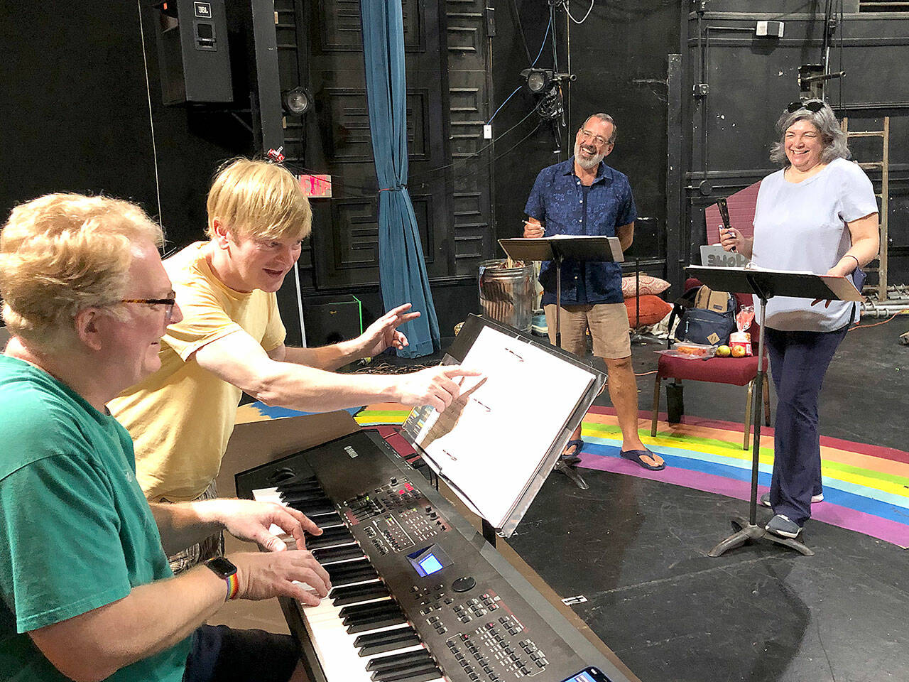 Grammy-winning Broadway orchestrator Steve Orich (second from right) presents his band arrangements to the cast of Somewhere Between, a jazz-pop musical by islander Alan Becker. Company members, from left, include Chris Serface, Cassi Q Kohl, Maria Valenzuela, Timothy Wilds, Casey Raiha, Orich, and Paul Linnes. (Alan Becker Photo)