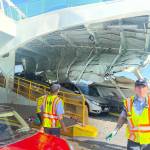 Immediately after the crash, islander Pam Kirkpatrick captured the chaotic scene, showing metal folded over the tops of cars on the left side of the boat. (Pam Kirkpatrick Photo)