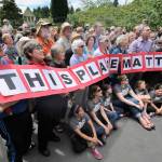 Helen Meeker (front standing row, fourth from left, in dark glasses) at the This Place Matters street gathering held on June 1, 2013. Meeker was deeply involved in the effort to put Mukai Farm & Garden back into the hands of the public. (Rick Wallace Photo)