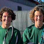 Singles players Nick Zuckerman (left) and Moses Trundle-Strachan had plenty to smile about after three wins for boys tennis on Vashon. (Rick Doussett Photo)