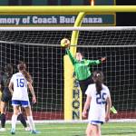 Keeper Ivy Staczek soars for Vashon (T. Puz Photo).