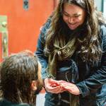 On Dec. 2, Jake Wolcott got down on bended knee in Vashon Theatres entryway to propose and present a ring to his true love, Becca Meyers  a display of devotion that delighted all the movie-lovers in attendance (Todd Pearson Photo).