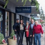 (Left to right) Preben Martin, Nicole Donnelly Martin, Linda Bianchi, Calvin Lyford, regional VP for Sothebys International Affiliates, and Dick Bianchi celebrate the opening of a new real estate venture in downtown Vashon (Mallory MacDonald/Maxwell Creative Photo).