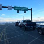 In the late afternoon of Monday, Jan. 16, a now-daily scene played out at Vashons north-end ferry dock  a long line of drivers waited, with no boat in sight, as the setting sun painted colors on the sky and water (Elizabeth Shepherd).
